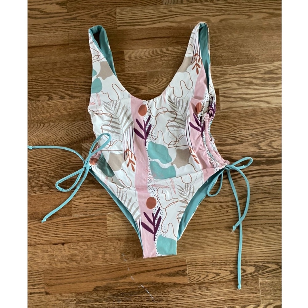 Strange Bikini One Piece. New with tags